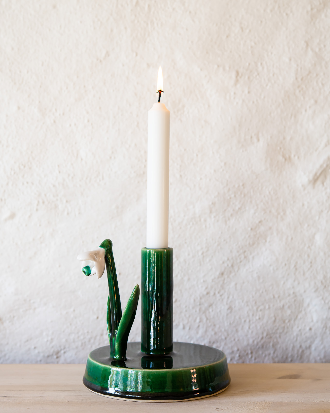 Ljusstake med snödroppe